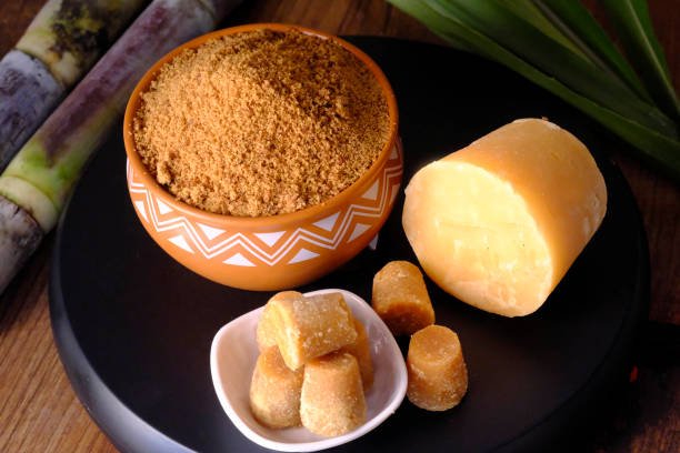 Jaggery powder with jaggery cubes. Jaggery is used as an ingredient in sweet and savoury dishes in the cuisines of India.